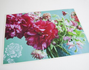 Laminated table set photo bouquet of fushia peonies and scented peas