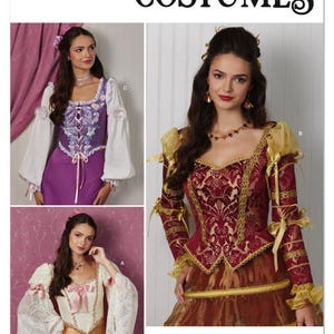 May include: Simplicity Costumes pattern S3191 featuring three different medieval-style dresses. The costumes include long sleeves, lace-up bodices, and decorative trim. The image includes the text "Simplicity Costumes" and "Designed and printed in USA."