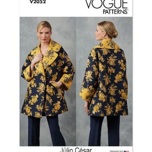 May include: Vogue Patterns V2052 sewing pattern for a coat with a floral print. The coat has a yellow and blue floral pattern with a yellow collar and cuffs. The pattern is designed by Julio Cesar.