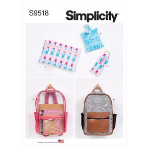 May include: Simplicity sewing pattern S9518 for making four bags: a clear backpack with pink accents, a gray backpack with a brown flap, a small blue zippered pouch with lipstick print, and a small blue pouch with XOXO print.