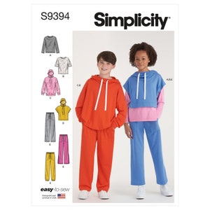 May include: Simplicity sewing pattern S9394 for a hooded sweatshirt and pants. The pattern includes instructions for making a hooded sweatshirt with a drawstring, a short-sleeved top, and pants with pockets. The pattern is designed for easy sewing and is printed in the USA.