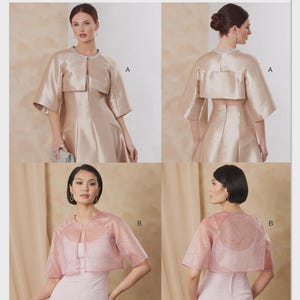 May include: Vogue Patterns V2182 sewing pattern envelope featuring two bolero jacket styles. Style A is a solid champagne-colored satin bolero with elbow-length sleeves. Style B is a sheer, textured pink bolero with short sleeves. Both designs are shown.