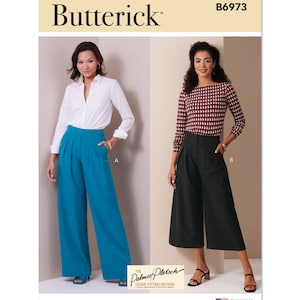 May include: A sewing pattern for wide-legged pants and culottes. The pattern includes two views: A, a pair of wide-legged pants, and B, a pair of culottes. The pants are teal blue and the culottes are black. The pattern is from Butterick and is designed and printed in the USA.