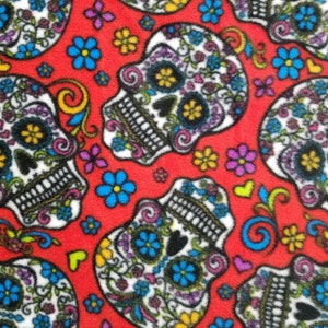 Folkloric Skulls Red Fleece Sold by the Yard