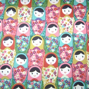 Multi-colored Dolls Cotton Fabric by the yard