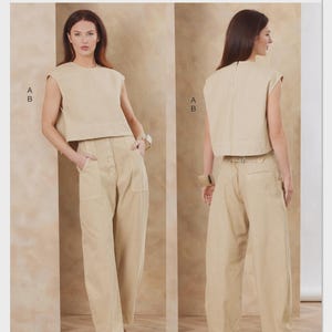May include: Vogue Patterns V2186 Rachel Comey sewing pattern envelope featuring a beige sleeveless cropped top and high-waisted wide-leg trousers with a front button placket. The design shows both front and back views of the garment set.
