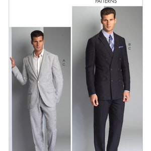 May include: Two men's suits, one in a light gray pinstripe and the other in a dark navy blue. Both suits have a double-breasted jacket style. The suit on the left has a single button closure, while the suit on the right has a double button closure. Vogue Patterns V8988.
