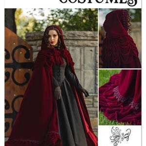 May include: Simplicity Costumes pattern S3190. The image shows a woman wearing a burgundy velvet hooded cloak and a long gray dress. The cloak has a ruffled trim and is paired with gray gloves. The pattern includes a QR code for a video tutorial.