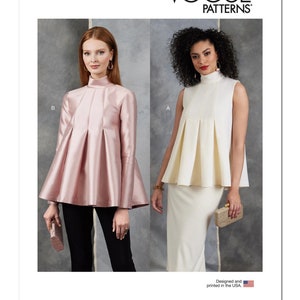 May include: Vogue Patterns sewing pattern V1909 for a sleeveless top with a high neck and pleated bodice. The pattern includes two variations: a long-sleeved top with a high neck and pleated bodice, and a sleeveless top with a high neck and pleated bodice.