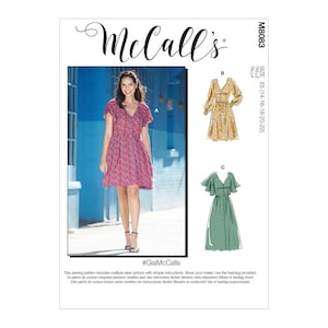 May include: McCall's sewing pattern M8083 featuring multiple dress designs. The image shows a woman wearing a red floral print dress. The pattern includes sizes E5 (14-16-18-20-22).