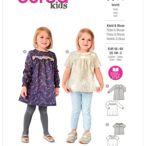 May include: Burda Kids sewing pattern featuring two young girls modeling a dress and blouse. The pattern includes sizes EUR 56-98 and US 1M-3. The dress is navy blue with a floral pattern, and the blouse is beige.