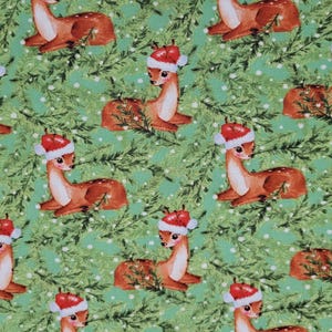 Santas Reindeer in Pine on Green Cotton Fabric Sold by the Yard