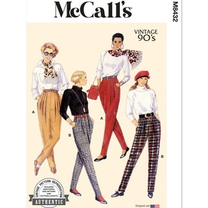 May include: Vintage McCall's sewing pattern for women's pants. The pattern includes three different styles of pants: a pair of tan pants, a pair of black and white plaid pants, and a pair of red and black plaid pants. The pattern is labeled "Vintage 90's" and "M8432".