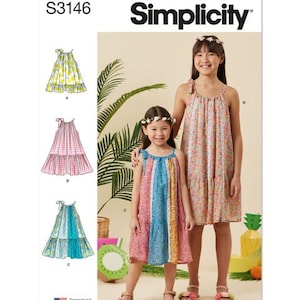 May include: Simplicity pattern S3146 features girls' dresses. The image shows two girls wearing dresses, and illustrations of the dress designs. The dresses have tiered skirts and tie straps. The pattern includes designs with floral, striped, and color-blocked patterns.