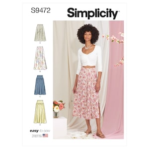 May include: Simplicity sewing pattern S9472 for a skirt with four different variations. The pattern shows a model wearing a floral print skirt with a white top. The pattern is labeled "easy-to-sew" and "designed and printed in USA".