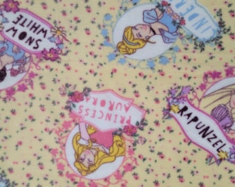 Disney Princesses on Yellow Anti Pill Fleece Fabric (27 inches)