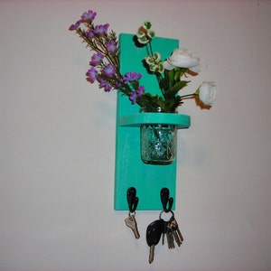 wall sconce key holder with flower display