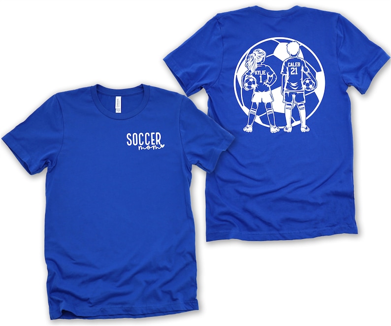 May include: Blue t-shirt with the text "SOCCER mom" on the front. The back of the shirt features a white silhouette of two children playing soccer with the names "KYLIE" and "CALEB" on their jerseys.