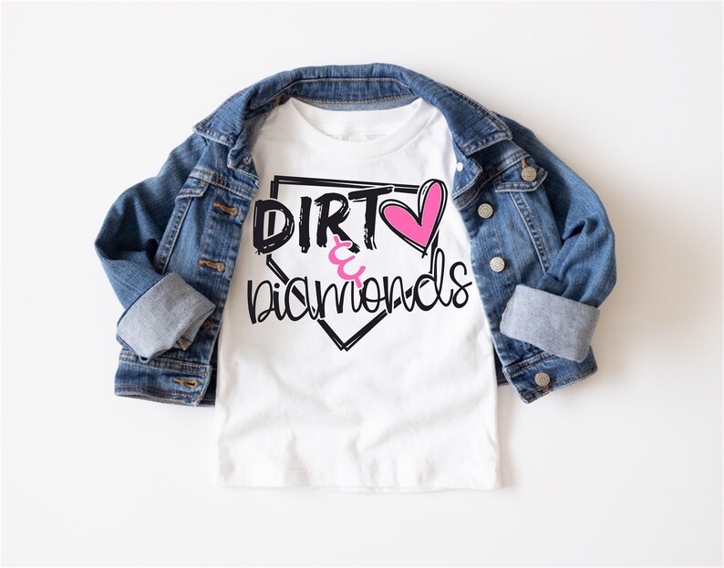 May include: White t-shirt with a black and white baseball diamond graphic. The graphic says "Dirt & Diamonds" with a pink heart in the middle.