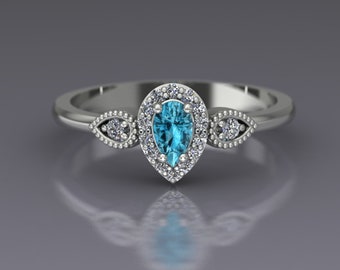 Pear Cut Blue Zircon Petite Diamond Halo December Birthstone Ring in 14k White Gold - An Original Design by Charles Babb