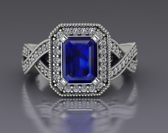 Emerald Cut Blue Sapphire and Diamond Halo Engagement Ring with Crossover Shank in 14k White Gold - An Original Design by Charles Babb