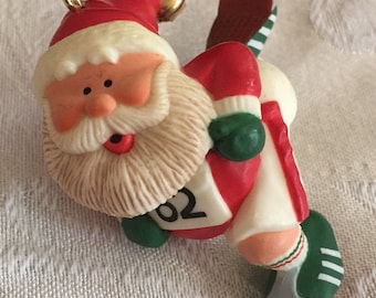 Vintage Hallmark Santa Claus Runner Holiday Ornament 1982 EC