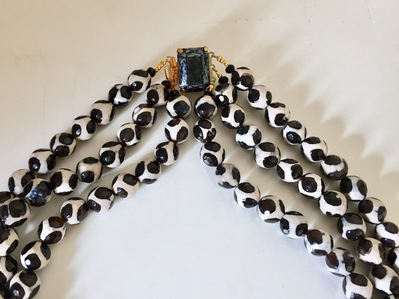 Black and white glass beads necklace with a vintage black enamel  belt buckle
