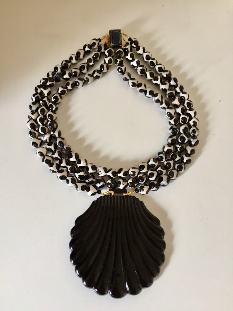 Black and white glass beads necklace with a vintage black enamel belt buckle