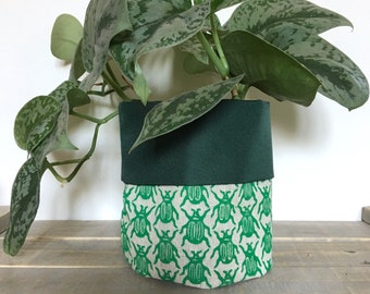 Beetle planter. Fabric plant pot or home storage. Handprinted with linocut insect design on cotton. Hand sewn.