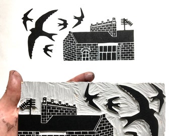 Limited edition London linocut print. Swifts over London rooftops. 8x17cm.