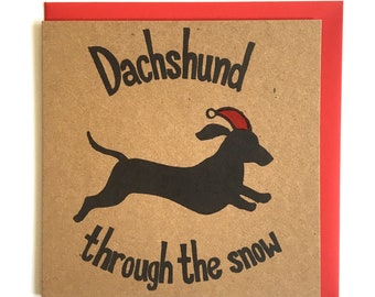 Funny Christmas card. Dachshund through the snow linocut Christmas card. Recycled card.