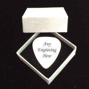 High quality, Plectrum with any engraving on one or both sides. Gift Box