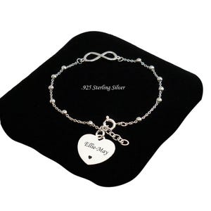 Personalised Silver Bracelet with Infinity Symbol and Engraved Heart Charm. 925 Sterling Silver. Size Adjustable.
