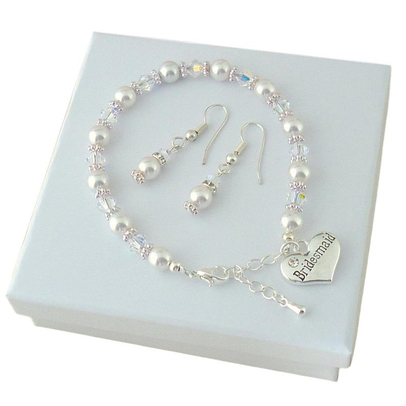 Pearl and Crystal AB Bracelet and Earrings set for Bridesmaid. Many Pearl Colours. High Quality, Bracelet features a pretty silver heart charm inscribed with Bridesmaid with a tiny sparkling crystal.