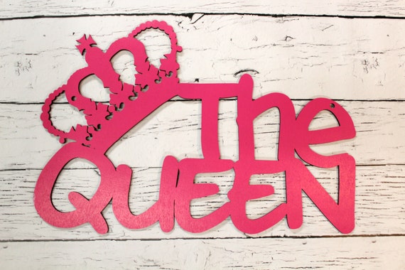 The Queen wood sign