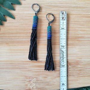 Teal and black tassel earrings