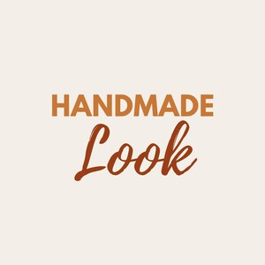 May include: A graphic design on a light beige background featuring the word HANDMADE in bold, uppercase, orange-brown sans-serif letters, positioned above the word Look written in a dark brown, cursive, handwritten-style script font.