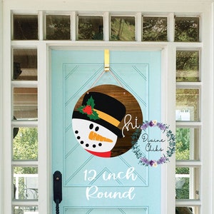 Christmas Snowman Door Hanger: 12&quot; Round Wood Welcome Sign