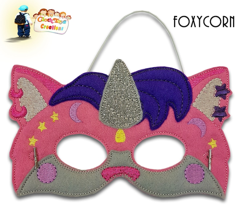 May include: Pink felt unicorn mask with a silver glitter horn, purple mane, and gray face. The mask has a white elastic band for wearing.