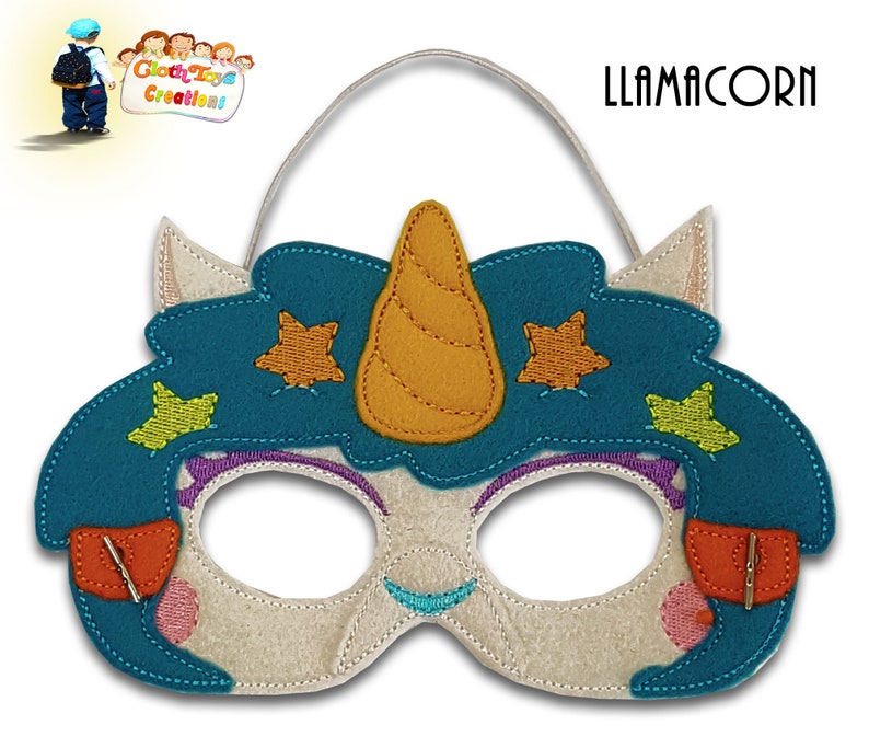 May include: A felt llamacorn mask with a teal blue mane, orange horn, and yellow and green stars. The mask has eye holes and an elastic band for wearing.
