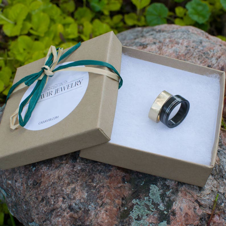 Titanium Mens wedding band with two subtle gold inlays.