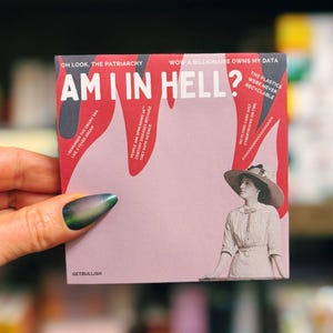 May include: A square, pink and red paper product with the text "AM I IN HELL?" and other phrases. The product features a vintage image of a woman in a hat. The text includes "OH LOOK, THE PATRIARCHY" and "WOW A BILLIONAIRE OWNS MY DATA".
