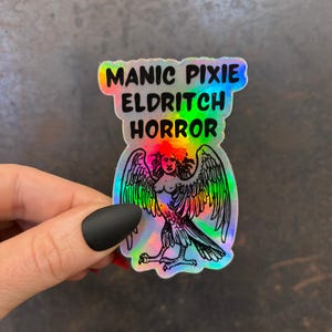 Manic Pixie Eldritch Horror Holographic Rainbow Vinyl Sticker | Vinyl Die Cut Decal Halloween Goth