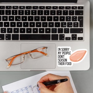 I'm Sorry My People Don't Season Their Food Die Cut Vinyl Sticker on top of laptop
