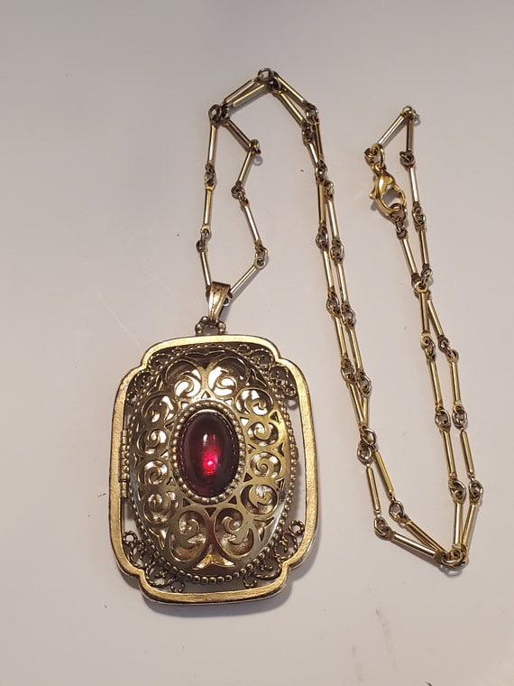 Avon Goldtone Filligree Red Stone Locket Necklace