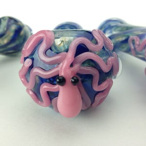 Glass pipe - ocean swirls with pink, purple, teal, white, blue, or black  octopus.