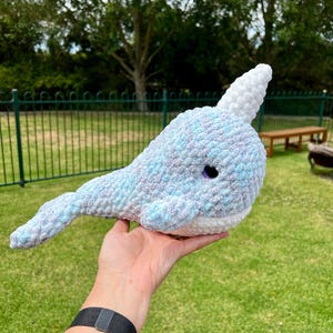 Handmade crochet Narwhal plush toy.