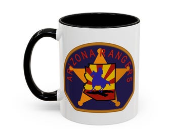 Taza de café de 11 oz en blanco y negro con el parche de los Arizona Rangers, de Jan (también conocida como TheGlassyLass).