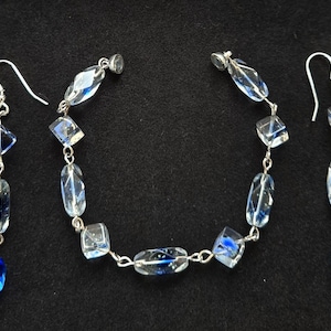 Rejewelvenation bracelet and matching earrings, one off design in crystal and blue glass from Art Deco jewellery. N126S
