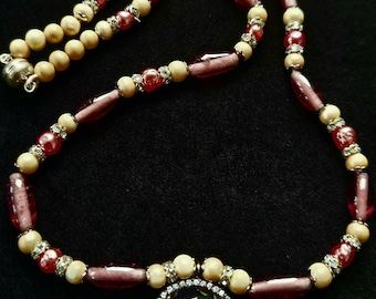 Charming Miriam Haskell Pearls and Glass beads with amethyst and diamante highlights. 16 inches/40cm choker style  NO89